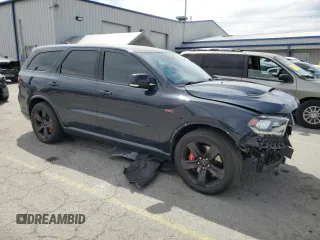 2018 Dodge Durango SRT with VIN 1C4SDJGJ1JC176749, listed as a Copart auction lot 52998575 with 49,234 mi miles and Salvage title. Bid and sale history available at DreamBid. Image 4.