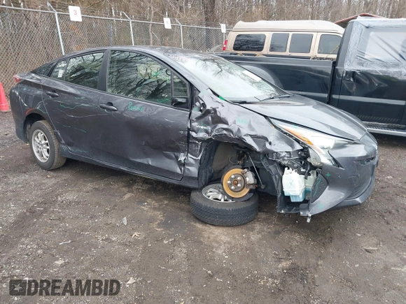 2018 Toyota Prius Two z VIN JTDKBRFU7J3065008, wystawiony jako IAAI lot #41744883 z przebiegiem 94 031 mil mil oraz . Historia ofert i sprzedaży dostępna na DreamBid. Obrazek 1.