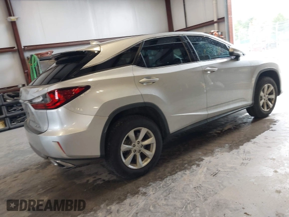 2017 Lexus RX with VIN 2T2ZZMCA7HC052926, listed as a IAAI auction lot 41929054 with 97,886 mi miles. Bid and sale history available at carsss.com. Image 4.