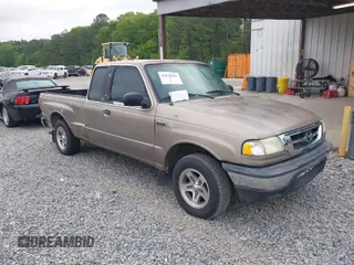 2003 Mazda B-Series 2WD Truck SE with VIN 4F4YR46VX3TM16294, listed as a IAAI auction lot 42034107 with 165,007 mi miles. Bid and sale history available at carsss.com. Image 1.