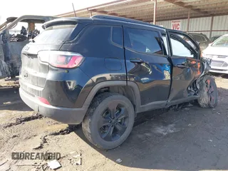 2019 Jeep Compass Latitude with VIN 3C4NJDBB1KT648185, listed as a IAAI auction lot 41622077 with 74,072 mi miles and . Bid and sale history available at DreamBid. Image 4.