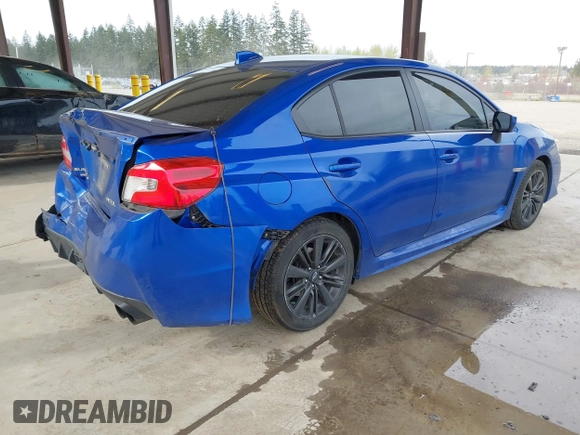 2015 Subaru WRX Premium with VIN JF1VA1D60F8817802, listed as a IAAI auction lot 42009071 with 82,464 mi miles and . Bid and sale history available at DreamBid. Image 4.