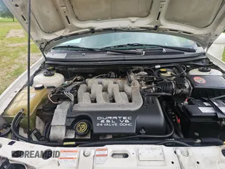 1998 Mercury Mystique z VIN 1MEFM66L2WK653881, wystawiony jako Copart lot #57662125 z przebiegiem 119 189 mil mil oraz Tytuł czysty. Historia ofert i sprzedaży dostępna na DreamBid. Obrazek 7.