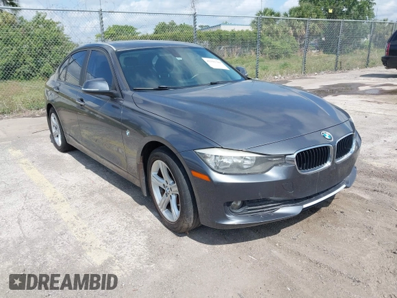 2013 BMW 3 Series 320i with VIN WBA3B1C5XDF462859, listed as a IAAI auction lot 42191369 with 140,253 mi miles and . Bid and sale history available at carsss.com. Image 1.