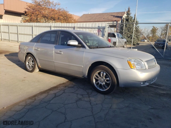 2005 Mercury Montego Premier with VIN 1MEFM43165G608323, listed as a Copart auction lot 77156404 with 138,150 mi miles and Salvage Title. Bid and sale history available at carsss.com. Image 4.