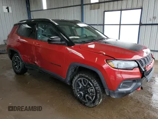 2025 Jeep Compass Trailhawk with VIN 3C4NJDDNXST550943, listed as a Copart auction lot 58935895 with 5,059 mi miles and Salvage title. Bid and sale history available at DreamBid. Image 4.