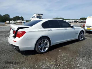 2014 BMW 7 Series 750i с VIN WBAYA8C53ED824903, выставлен на аукционе Copart как лот 56353665 с пробегом 82 240 миль миль и Списание • Salvage title. История ставок и продаж доступна на DreamBid. Изображение 3.