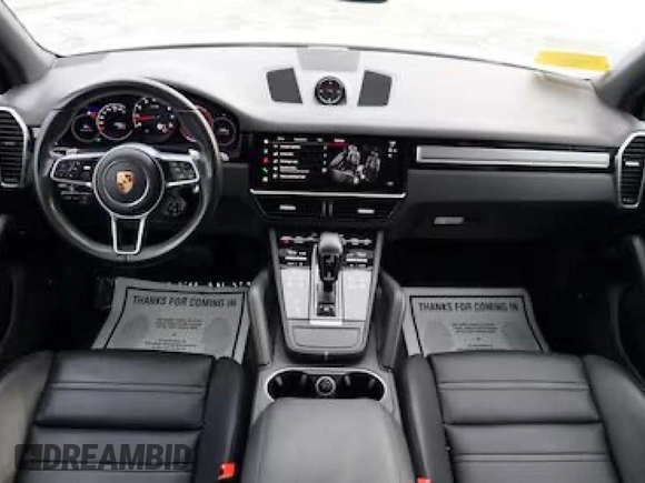 2022 Porsche Cayenne z VIN WP1AA2AY2NDA06673, wystawiony jako Copart lot #42586635 z przebiegiem 17 392 mil mil oraz Czysty tytuł • Clean title. Historia ofert i sprzedaży dostępna na DreamBid. Obrazek 9.