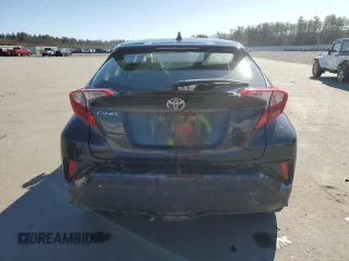 2019 Toyota C-HR XLE z VIN JTNKHMBX0K1040753, wystawiony jako Copart lot #52370615 z przebiegiem 120 056 mil mil oraz Szkoda całkowita • Salvage title. Historia ofert i sprzedaży dostępna na DreamBid. Obrazek 6.