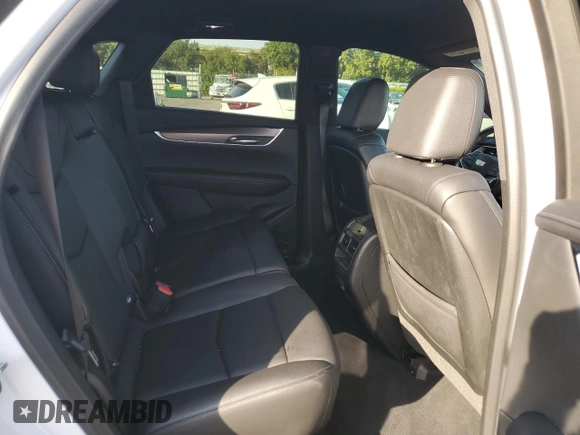 2022 Cadillac XT5 FWD Luxury z VIN 1GYKNAR49NZ118633, wystawiony jako Copart lot #43274175 z przebiegiem 46 946 mil mil oraz Szkoda całkowita • Salvage title. Historia ofert i sprzedaży dostępna na DreamBid. Obrazek 11.