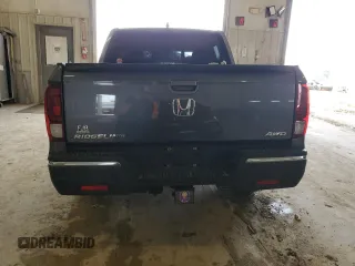 2018 Honda Ridgeline RTL-E z VIN 5FPYK3F77JB007492, wystawiony jako Copart lot #43716475 z przebiegiem Nie podano mil oraz Szkoda całkowita • Salvage title. Historia ofert i sprzedaży dostępna na DreamBid. Obrazek 6.
