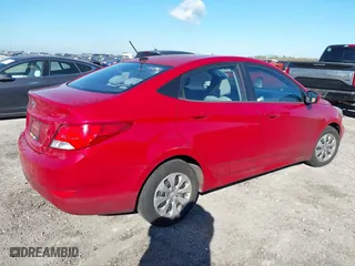 2015 Hyundai Accent GLS with VIN KMHCT4AE8FU833113, listed as a IAAI auction lot 40975977 with 143,038 mi miles. Bid and sale history available at carsss.com. Image 4.