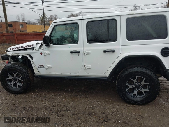 2018 Jeep Wrangler Unlimited Rubicon with VIN 1C4HJXFG6JW301254, listed as a IAAI auction lot 41654089 with 71,364 mi miles and . Bid and sale history available at DreamBid. Image 14.