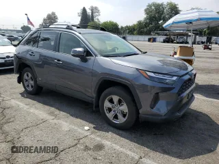 2024 Toyota RAV4 Hybrid LE with VIN JTMMWRFV7RD233242, listed as a Copart auction lot 60878815 with 11,064 mi miles and Salvage title. Bid and sale history available at DreamBid. Image 4.