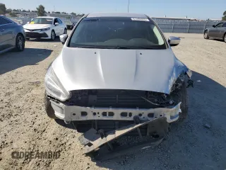 2018 Ford Focus SE with VIN 1FADP3FE4JL308909, listed as a Copart auction lot 61489005 with 58,613 mi miles and Salvage title. Bid and sale history available at DreamBid. Image 5.
