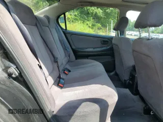 2001 Nissan Maxima SE with VIN JN1CA31D51T826665, listed as a Copart auction lot 63683545 with 95,931 mi miles and Salvage title. Bid and sale history available at DreamBid. Image 10.