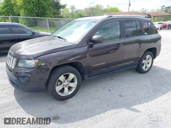 2014 Jeep Compass Latitude with VIN 1C4NJDEBXED622352, listed as a IAAI auction lot 42130403 with 149,024 mi miles. Bid and sale history available at carsss.com. Image 2.