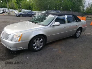 2007 Cadillac DTS Luxury I z VIN 1G6KD57Y97U196841, wystawiony jako Copart lot #55702525 z przebiegiem 105 465 mil mil oraz Szkoda całkowita • Salvage title. Historia ofert i sprzedaży dostępna na DreamBid. Obrazek 1.