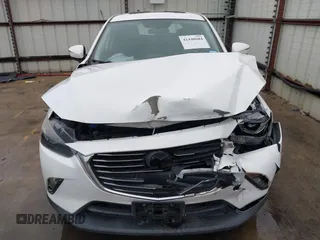 2016 Mazda CX-3 Grand Touring with VIN JM1DKBD73G0124742, listed as a IAAI auction lot 41448684 with 96,322 mi miles. Bid and sale history available at carsss.com. Image 12.