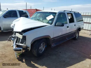 1998 GMC Suburban with VIN 1GKEC16RXWJ731468, listed as a IAAI auction lot 41945613 with 236,854 mi miles. Bid and sale history available at carsss.com. Image 17.