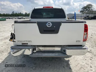 2009 Nissan Frontier SE with VIN 1N6AD07U19C411546, listed as a Copart auction lot 57683625 with 216,492 mi miles and Salvage title. Bid and sale history available at DreamBid. Image 6.