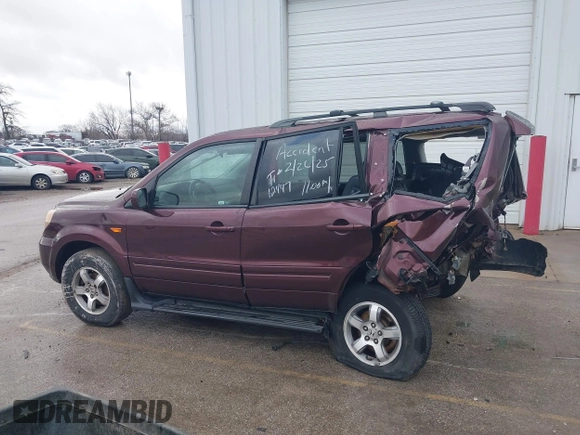 2007 Honda Pilot EX-L with VIN 2HKYF18547H533084, listed as a IAAI auction lot 41729988 with 199,886 mi miles and . Bid and sale history available at DreamBid. Image 13.