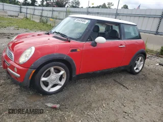 2002 MINI Hardtop with VIN WMWRC33422TE12260, listed as a Copart auction lot 66409484 with 112,119 mi miles and Salvage Title. Bid and sale history available at DreamBid. Image 1.