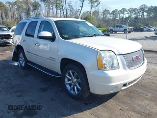 2012 GMC Yukon Denali with VIN 1GKS1EEF5CR156426, listed as a IAAI auction lot 41673781 with 147,022 mi miles. Bid and sale history available at carsss.com. Image 1.