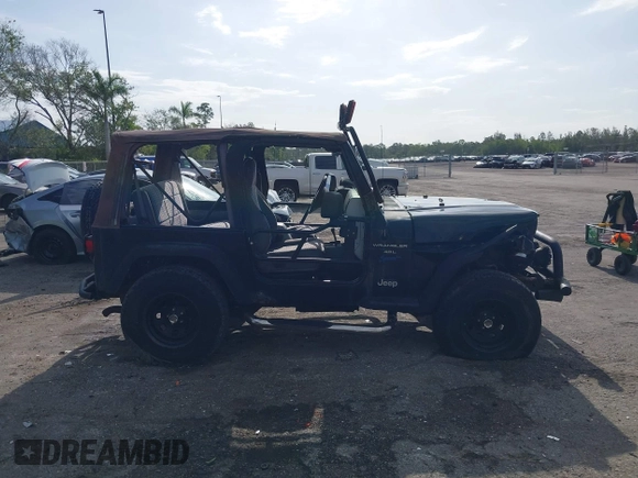 1997 Jeep Wrangler Sport with VIN 1J4FY19S5VP539283, listed as a IAAI auction lot 41996476 with 131,593 mi miles and . Bid and sale history available at DreamBid. Image 14.