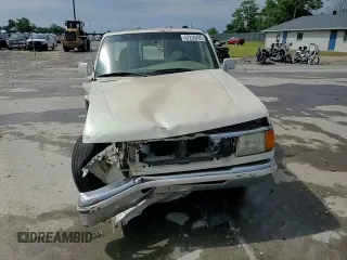 1997 Ford Ranger XLT with VIN 1FTCR10A8VPB29636, listed as a Copart auction lot 57250435 with 215,537 mi miles and Salvage title. Bid and sale history available at DreamBid. Image 13.