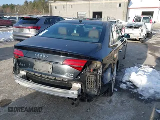 2015 Audi A8 L 4.0T with VIN WAU32AFD0FN035282, listed as a IAAI auction lot 41515136 with 76,518 mi miles. Bid and sale history available at carsss.com. Image 4.