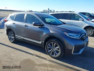 2021 Honda CR-V Touring with VIN 2HKRW2H96MH663358, listed as a IAAI auction lot 41217973 with 51,368 mi miles. Bid and sale history available at carsss.com. Image 1.