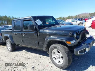 2023 Jeep Gladiator Sport S z VIN 1C6HJTAG8PL528821, wystawiony jako IAAI lot #41777653 z przebiegiem 65 656 mil mil oraz . Historia ofert i sprzedaży dostępna na DreamBid. Obrazek 13.