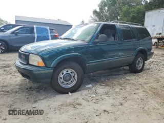 1998 GMC Jimmy SL with VIN 1GKCS13W8W2500566, listed as a Copart auction lot 51211875 with 0 mi miles and Non Repairable. Bid and sale history available at carsss.com. Image 1.