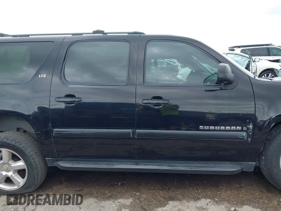 2007 Chevrolet Suburban LT with VIN 1GNFC16097R179358, listed as a IAAI auction lot 42104937 with Not provided miles and . Bid and sale history available at DreamBid. Image 13.