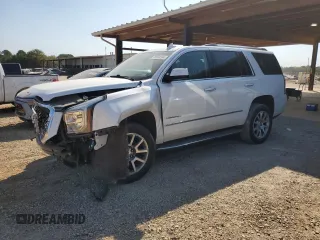 2020 GMC Yukon Denali with VIN 1GKS1CKJ6LR170901, listed as a Copart auction lot 76034594 with 118,738 mi miles and Salvage Title. Bid and sale history available at carsss.com. Image 1.