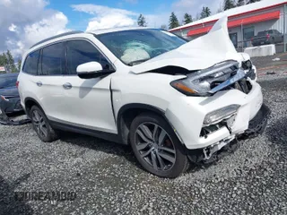 2016 Honda Pilot Elite with VIN 5FNYF6H05GB062868, listed as a IAAI auction lot 41804794 with 1 mi miles. Bid and sale history available at carsss.com. Image 1.