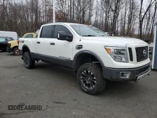 2016 Nissan Titan XD PRO-4X with VIN 1N6BA1F41GN515119, listed as a Copart auction lot 85419494 with 180,435 mi miles and Clean Title. Bid and sale history available at carsss.com. Image 4.