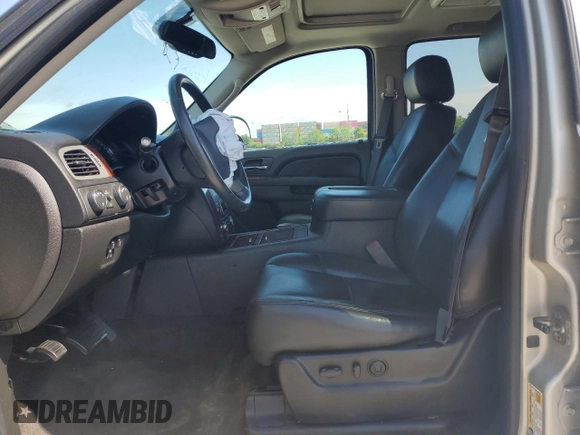 2014 Chevrolet Tahoe LTZ with VIN 1GNSKCE03ER201981, listed as a Copart auction lot 56421125 with 173,710 mi miles and Salvage title. Bid and sale history available at DreamBid. Image 7.