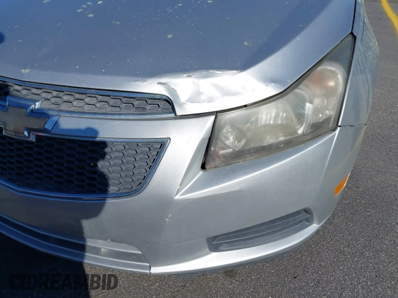 2014 Chevrolet Cruze 1LT with VIN 1G1PC5SB8E7201279, listed as a IAAI auction lot 41851574 with 125,806 mi miles and . Bid and sale history available at DreamBid. Image 12.