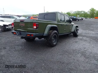 2023 Jeep Gladiator Mojave with VIN 1C6JJTEG6PL564504, listed as a IAAI auction lot 41752685 with 20,430 mi miles and . Bid and sale history available at DreamBid. Image 4.