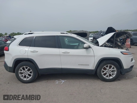 2018 Jeep Cherokee Latitude with VIN 1C4PJLCBXJD558927, listed as a IAAI auction lot 41942214 with 84,289 mi miles. Bid and sale history available at carsss.com. Image 13.