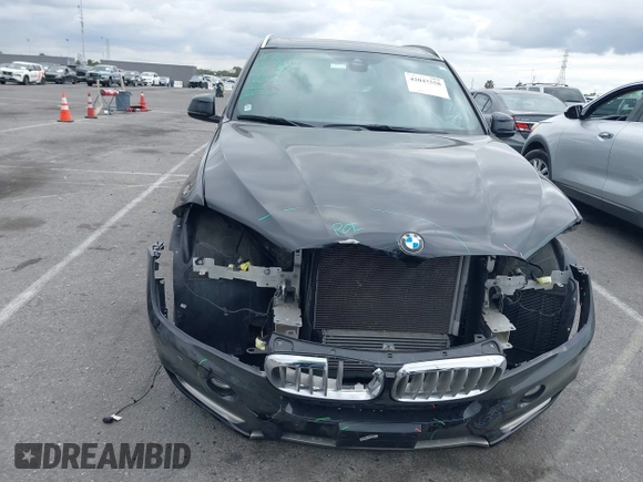 2018 BMW X5 xDrive35i with VIN 5UXKR0C55JL073210, listed as a IAAI auction lot 42047558 with 37,497 mi miles. Bid and sale history available at carsss.com. Image 13.