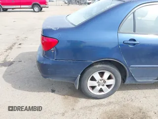 2004 Toyota Corolla CE with VIN JTDBR38E042034109, listed as a IAAI auction lot 42054614 with 162,116 mi miles. Bid and sale history available at carsss.com. Image 6.