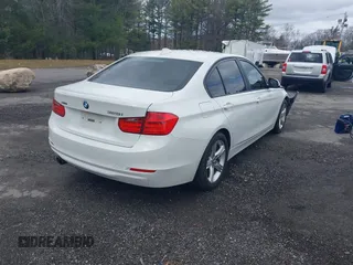 2015 BMW 3 Series 328i xDrive with VIN WBA3B5G50FNS15117, listed as a IAAI auction lot 41843496 with 144,613 mi miles. Bid and sale history available at carsss.com. Image 4.