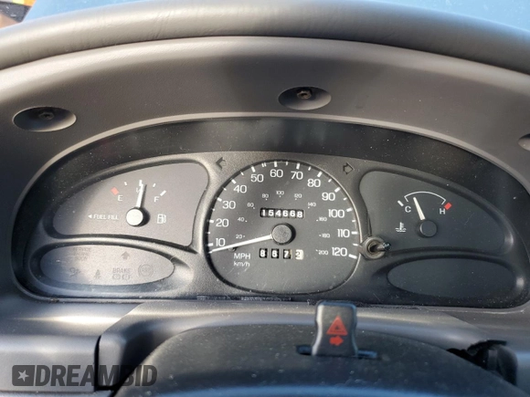 1999 Ford Escort SE z VIN 1FAFP13P8XW292868, wystawiony jako Copart lot #78498564 z przebiegiem 154 668 mil mil oraz Nie do naprawy • Non repairable. Historia ofert i sprzedaży dostępna na DreamBid. Obrazek 9.
