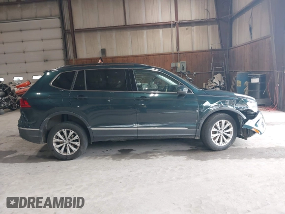 2018 Volkswagen Tiguan SEL with VIN 3VV2B7AX3JM133326, listed as a IAAI auction lot 42459190 with 94,665 mi miles and . Bid and sale history available at DreamBid. Image 13.