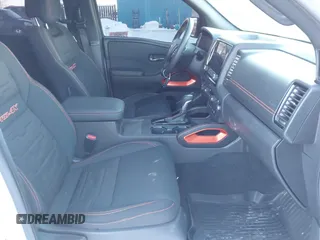 2024 Nissan Frontier Pro-4X with VIN 1N6ED1EK3RN620414, listed as a IAAI auction lot 41613820 with 10,714 mi miles and . Bid and sale history available at DreamBid. Image 5.