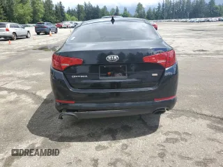 2013 Kia Optima LX z VIN 5XXGM4A79DG144608, wystawiony jako Copart lot #57461585 z przebiegiem 120 677 mil mil oraz Szkoda całkowita • Salvage title. Historia ofert i sprzedaży dostępna na DreamBid. Obrazek 6.