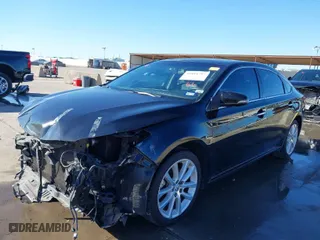 2014 Toyota Avalon Limited with VIN 4T1BK1EB9EU131698, listed as a IAAI auction lot 41811791 with 95,527 mi miles. Bid and sale history available at carsss.com. Image 2.